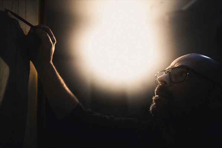 Alejandro Valbuena Martínez working in his studio
